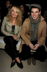 Laura Haddock and Sam Claflin at the Burberry Prorsum Show during the London Fashion Week Autumn/Winter 2011.