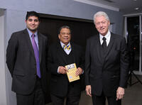 Author Kabir Sehgal, Ambassador Andrew Young and Bill Clinton at the "Walk In My Shoes: Conversations Between A Civil Rights Legend and His Godson on The Journey Ahead" book event in New York.