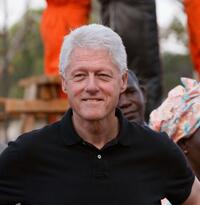 Bill Clinton at the rural hospital construction site in the village of Neno.