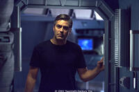 Chris Kelvin (George Clooney) investigates the mysteries aboard a space station orbiting a mysterious planet.
