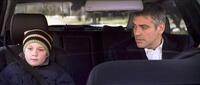 Austin Williams and George Clooney in "Michael Clayton."