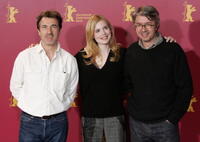 Francois Cluzet, Isabelle Carre and director Christian Vincent at the photo call of "Four Stars" (Quatre Etoiles) during the 56th Berlin International Film Festival (Berlinale).