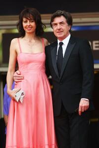 Valerie Bonneton and Francois Cluzet at the premiere of "In The Beginning" during the 62nd International Cannes Film Festival.