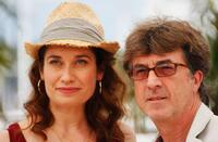 Emmanuelle Devos and Francois Cluzet at the photocall of "In The Beginning" during the 62nd International Cannes Film Festival.
