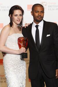 Kristen Stewart and Noel Clarke at the Orange British Academy Film Awards.