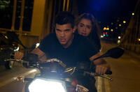 Taylor Lautner as Nathan and Lily Collins as Karen in "Abduction."