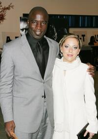 Mike Colter and Guest at the special screening of "Million Dollar Baby."