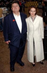 Robbie Coltrane with his companion at the world premiere of "Harry Potter and the Chamber of Secrets".