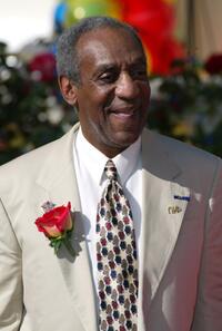 Bill Cosby looks over the crowd after he was announced as a Grand Marshall to lead the 2003 Rose Parade.
