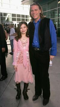 Miranda Cosgrove and Raja Gosnell at the premiere of "Yours Mine and Ours."