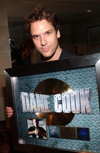 RIAA & Comedy Central present Dane Cook with gold record. 