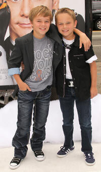 Maxwell Perry Cotton and Guest at the premiere of "Mr. Popper's Penguins."