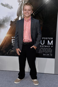 Maxwell Perry Cotton at the California premiere of "Elysium."