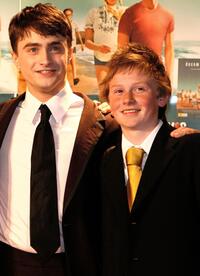 Daniel Radcliffe and Lee Cormie at the premiere of "December Boys."
