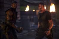 Terry Crews as Hale Caesar and Sylvester Stallone as Barney Ross in "The Expendables."