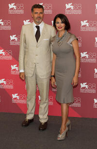 Maria Grazia Cucinotta and Guest at the photocall of "Il Maestro" during the 68th Venice International Film Festival.