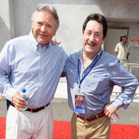 Frank Welker and Peter Cullen at the Transformers The Ride - 3D Grand Opening Celebration.