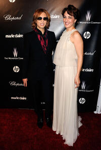 Musician Yoshiki and Meltem Cumbul at the 69th Annual Golden Globe Awards in California.