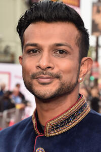 Utkarsh Ambudkar at the premiere of "Barbershop The Next Cut" in Hollywood.