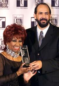Celia Cruz and Luis Guerra at the Latin Billboard Music Awards.