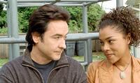 John Cusack and Sophie Okonedo in "Martian Child."