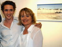 Sinead Cusack and Jeremy Irons at an exhibition of photographs of the security wall between Israel and Palestine.