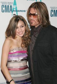 Miley Cyrus and Billy Ray Cyrus at the 40th Annual CMA Awards.