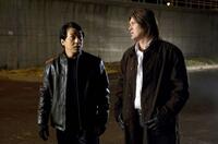 Jackie Chan as Bob Ho and Billy Ray Cyrus as Colton James in "The Spy Next Door."