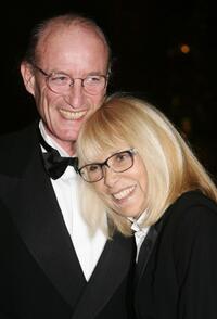 Mireille Darc and her husband at the international evening of the child.