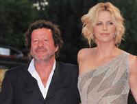 Joaquim de Almeida and Charlize Theron at the premiere of "The Burning Plain" during the 65th Venice Film Festival.