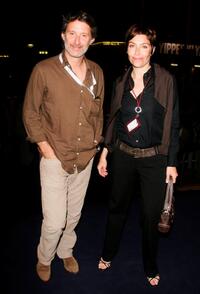 Antoine de Caunes and Daphne Roulier at the premiere of "Mio Fratello E Figlio Unico" during the 60th International Cannes Film Festival.