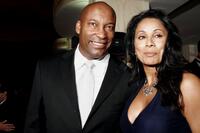 Director John Singleton and Wanda De Jesus at the National Hispanic Foundation for the Arts 10th Anniversary Celebration.