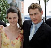 Jennifer Decker and James Franco at the photocall of "Flyboys" during the 58th International Cannes Film Festival.
