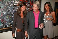 Alain Delon and his guests at the pre-launch cocktail party for his upcoming auction of paintings.