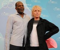 Alex Descas and Claire Denis at the photocall of "35 rhums" during the 65th Venice International Film Festival.