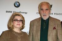 Catherine Deneuve and Christopher Lee at the photocall of "Cinema For Peace" during the 58th Berlinale Film Festival.