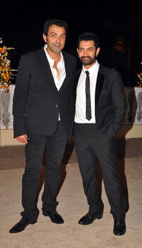 Bobby Deol and Aamir Khan at the wedding reception of Imran Khan and Avantika Malik in Mumbai.