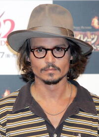 Johnny Depp at a press conference for "Pirates of the Caribbean: Dead Man's Chest" in Tokyo, Japan.