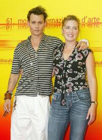 Johnny Depp and Kate Winslet at the photocall of "Finding Neverland" during the 61st Venice Film Festival.