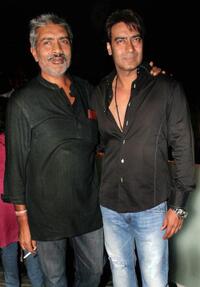 Director Prakash Zha and Ajay Devgan at the press meet of "Rajneeti."