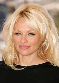 Pamela Anderson at the photocall promoting "Blonde And Blonder" during the 60th International Cannes Film Festival.