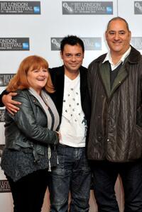 Lesley Nicol, Emil Marwa and Ayub Khan Din at the photocall of "West Is West" during the 54th BFI London Film Festival.