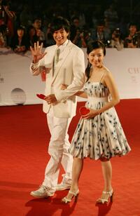 Peter Ho and Dong Jie at the opening ceremony of the 11th Shanghai International Film Festival.