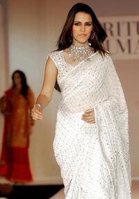 Neha Dhupia at the Winter-Spring 2005-06 collection of Indian designer Ritu Kumar during the fashion show.