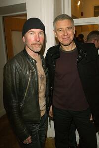The Edge and Adam Clayton at the opening of the new collection by artist Guggi.