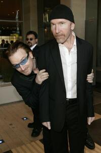 Bono and The Edge at the Thanksgiving Dinner for the 46664 Give One Minute of Your Life to AIDS.