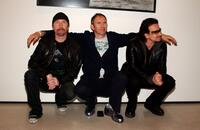 The Edge, Anton Corbijn and Bono at the opening of Anton Corbijn's photo exhibition.