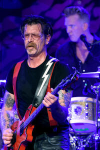 Jesse Hughes and Josh Homme of Eagles of Death Metal perform in Los Angeles.