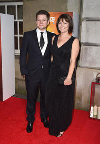 Taron Egerton and guest at the 58th BFI London Film Festival in London.