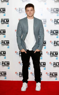 Taron Egerton at the photocall of "Testament Of Youth" during the 58th BFI London Film Festival.